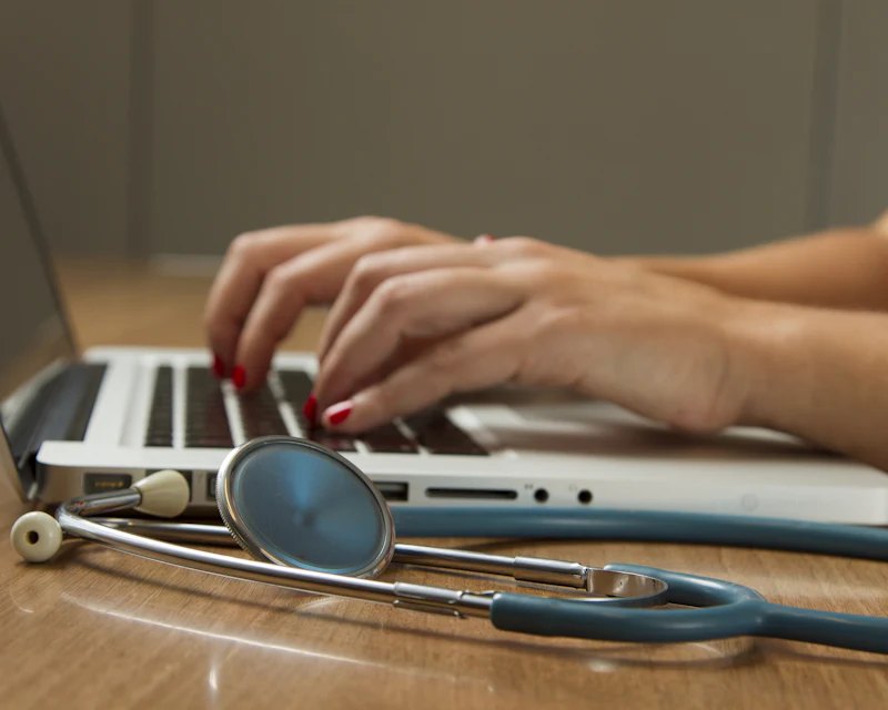 Clinician reviewing patient notes
